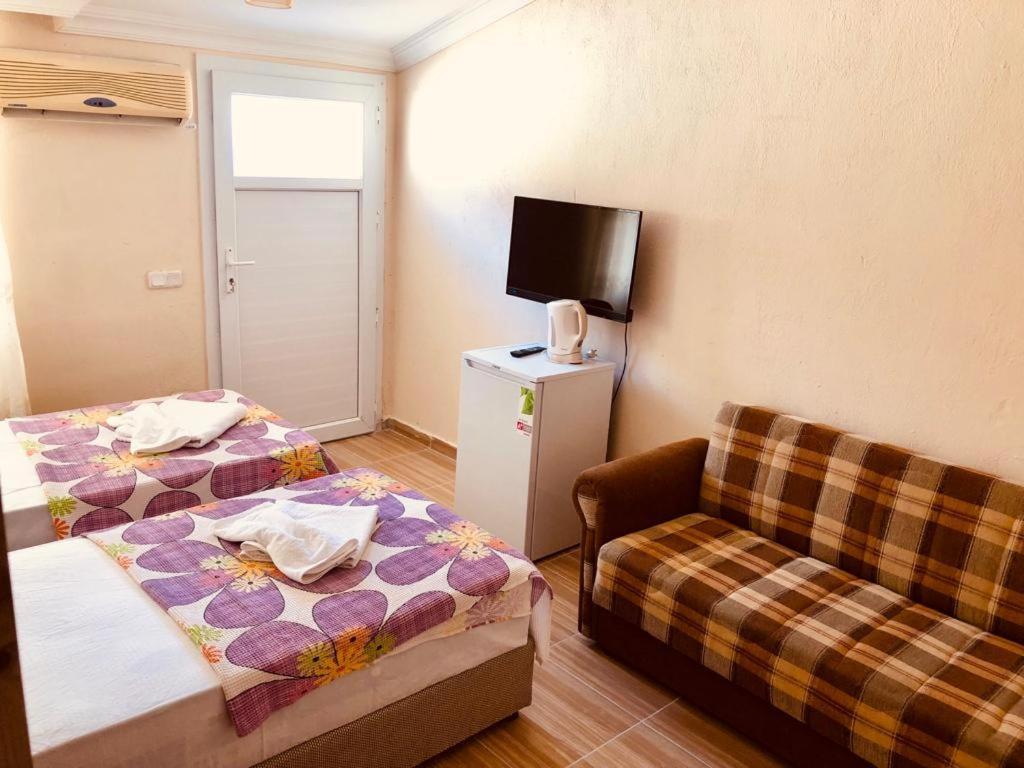 Karaca Apart Hotel Далян Екстериор снимка