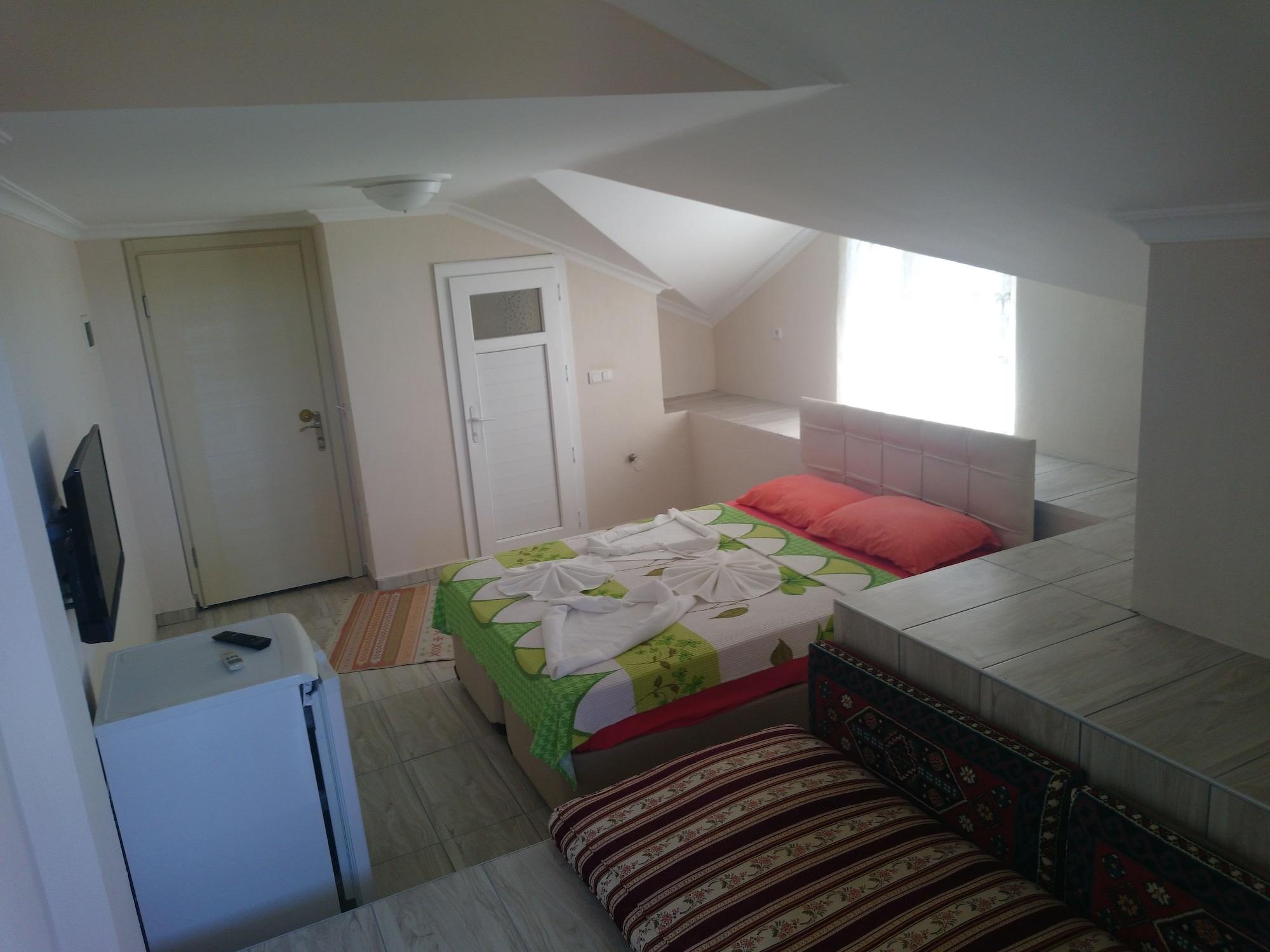 Karaca Apart Hotel Далян Екстериор снимка
