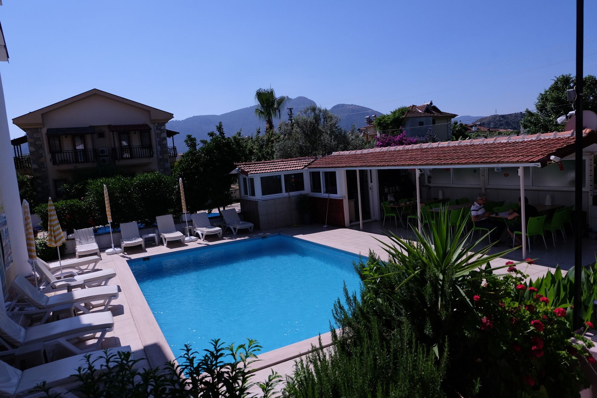 Karaca Apart Hotel Далян Екстериор снимка